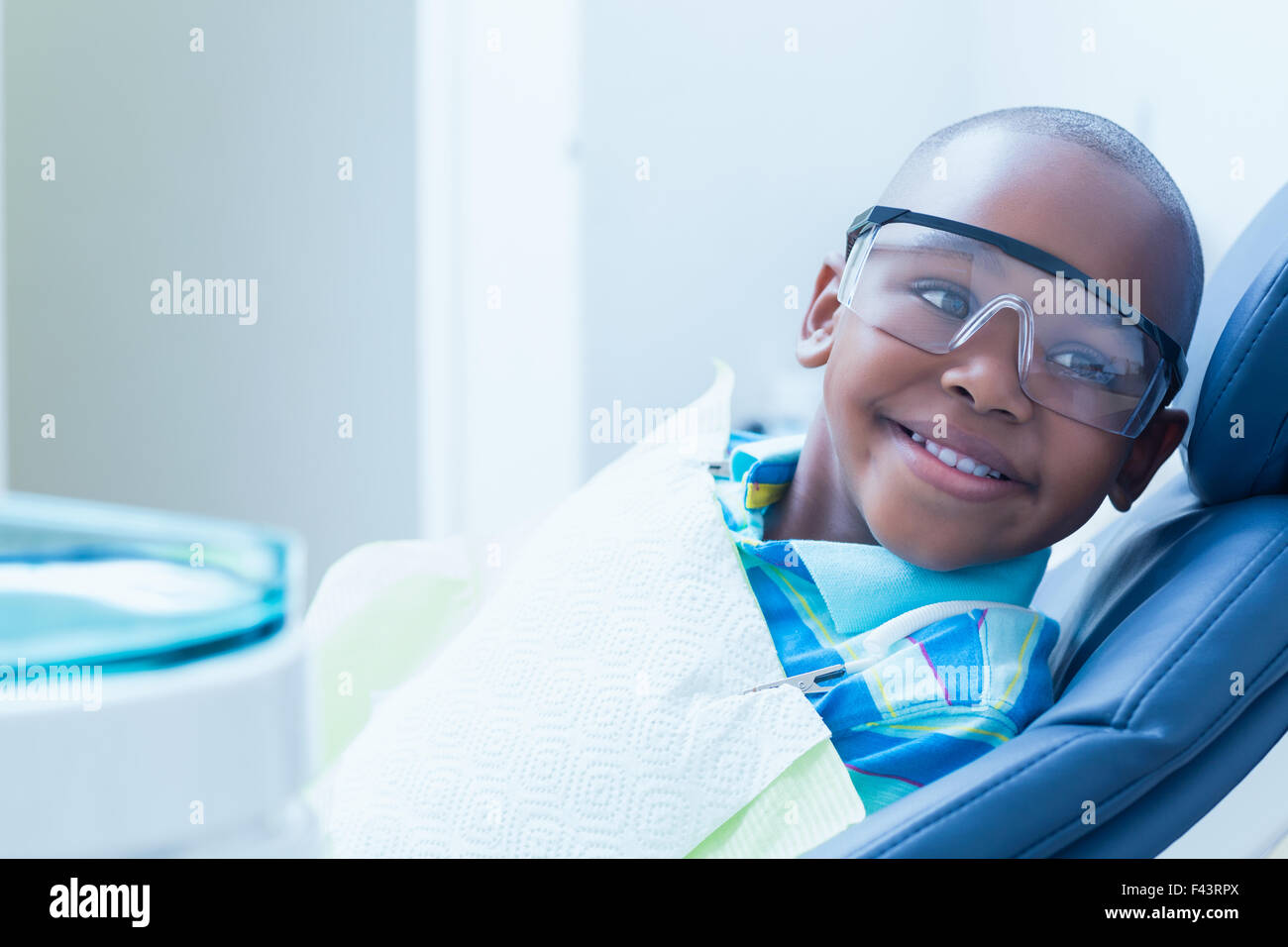 Smiling boy waiting for dental exam Stock Photo