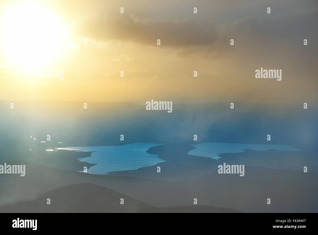 Golden sun above lake hi-res stock photography and images - Alamy