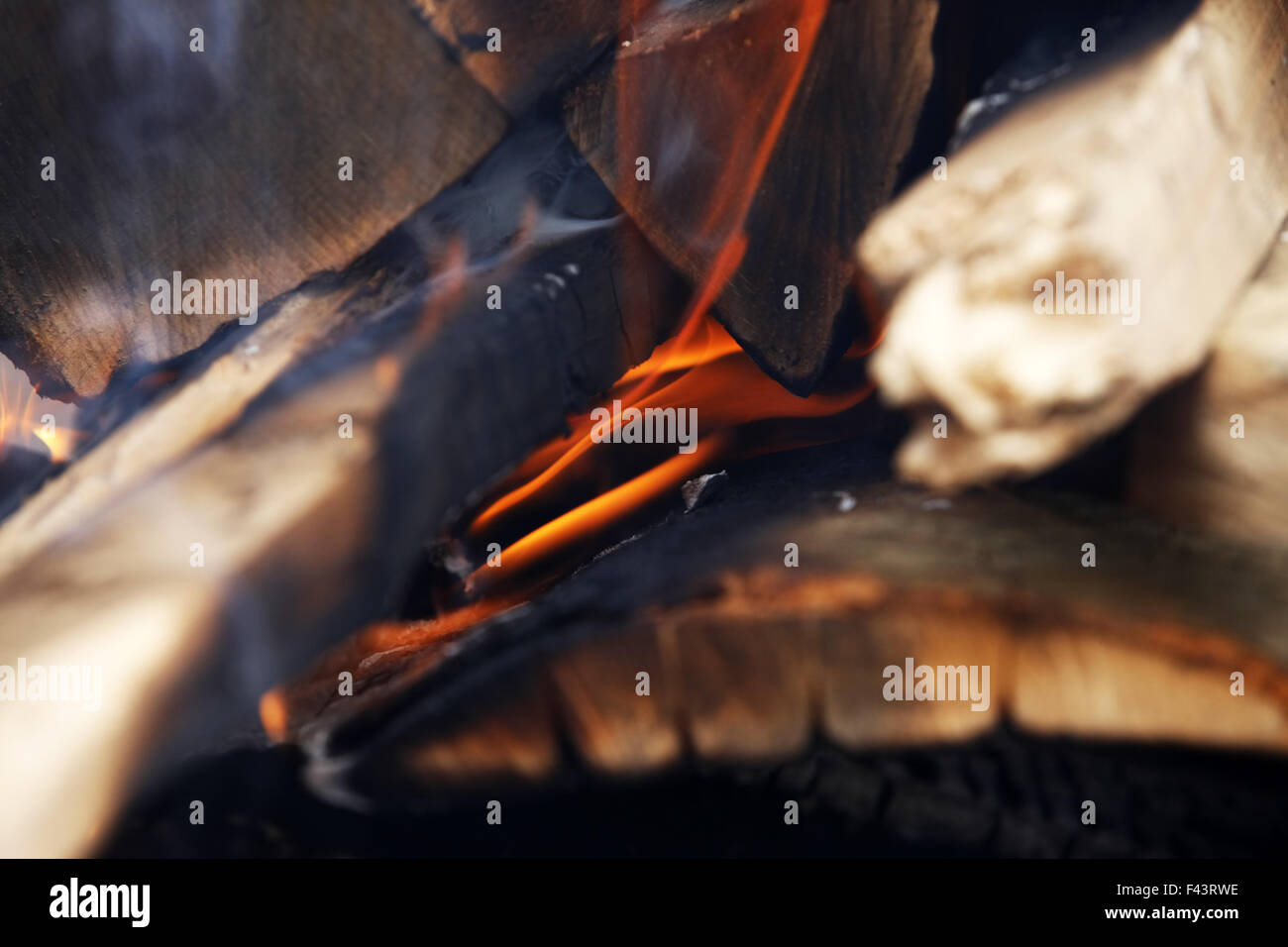 Flames and glow in a wood burner Stock Photo Alamy