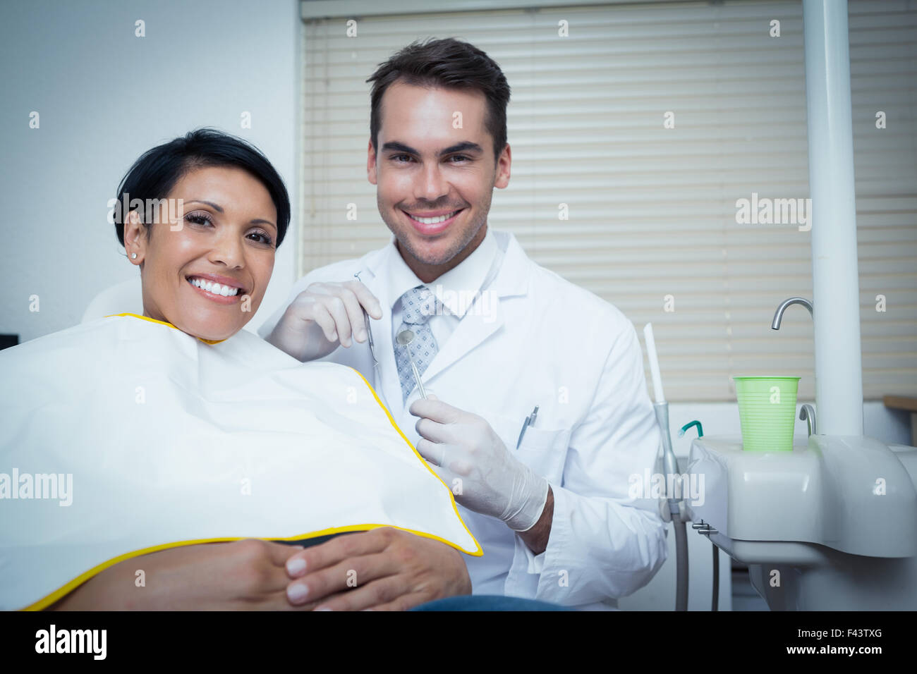Smiling woman waiting for dental exam Stock Photo