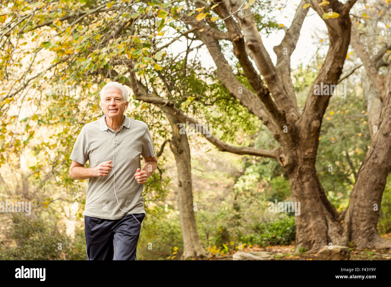 Senior man working out in park Stock Photo