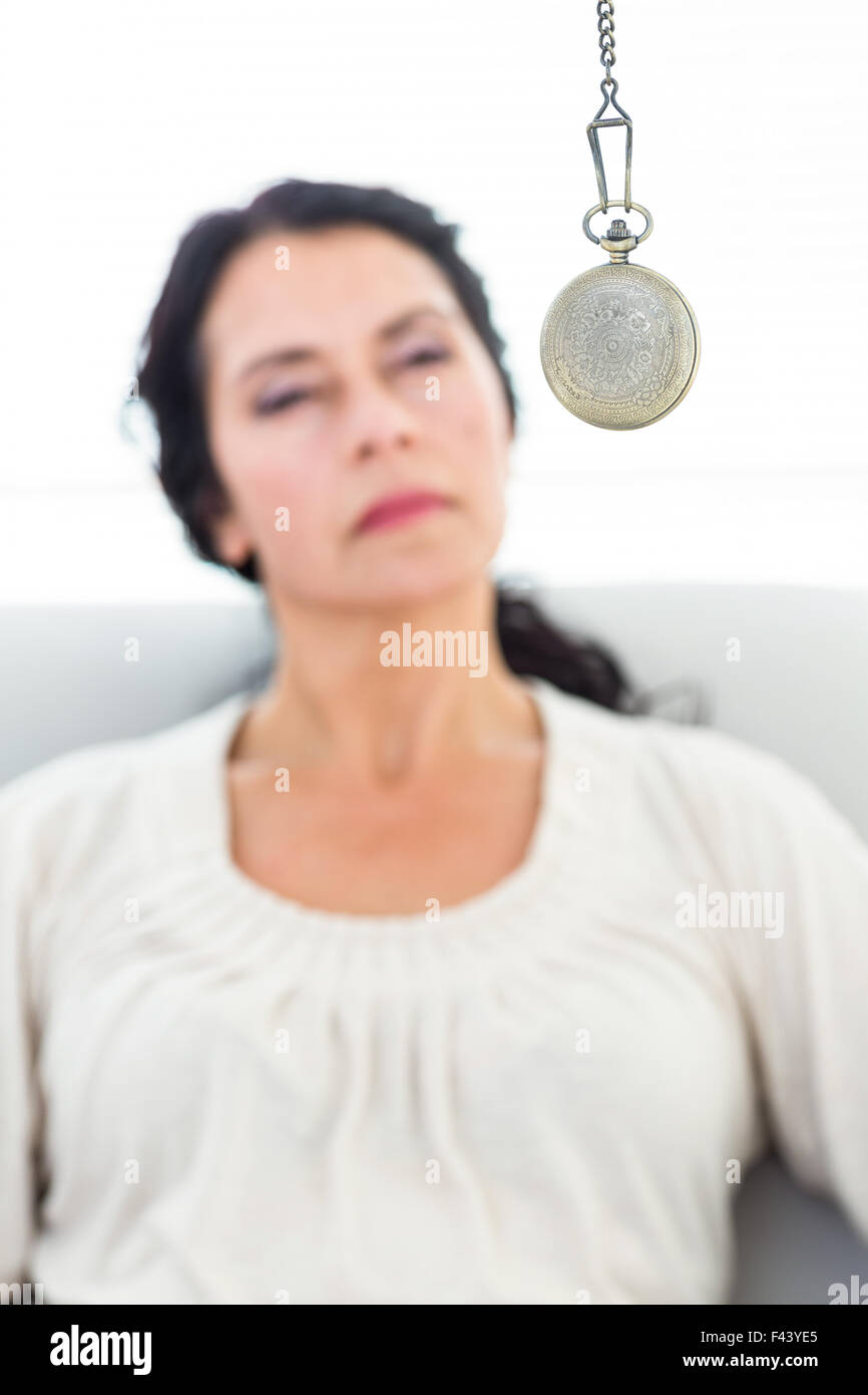 Woman being hypnotized Stock Photo