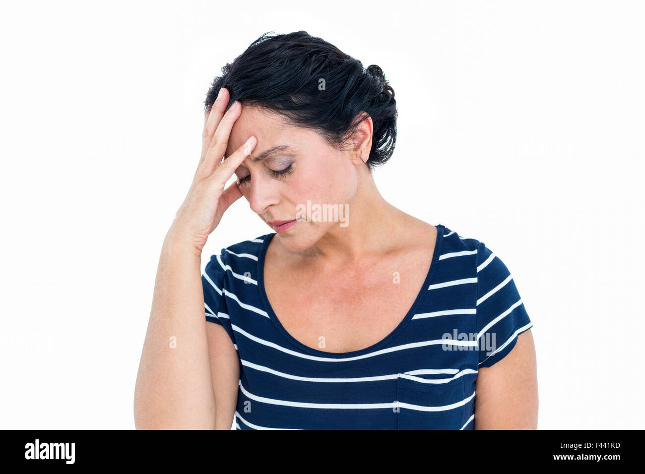Sad woman sitting with head in hands Stock Photo Alamy