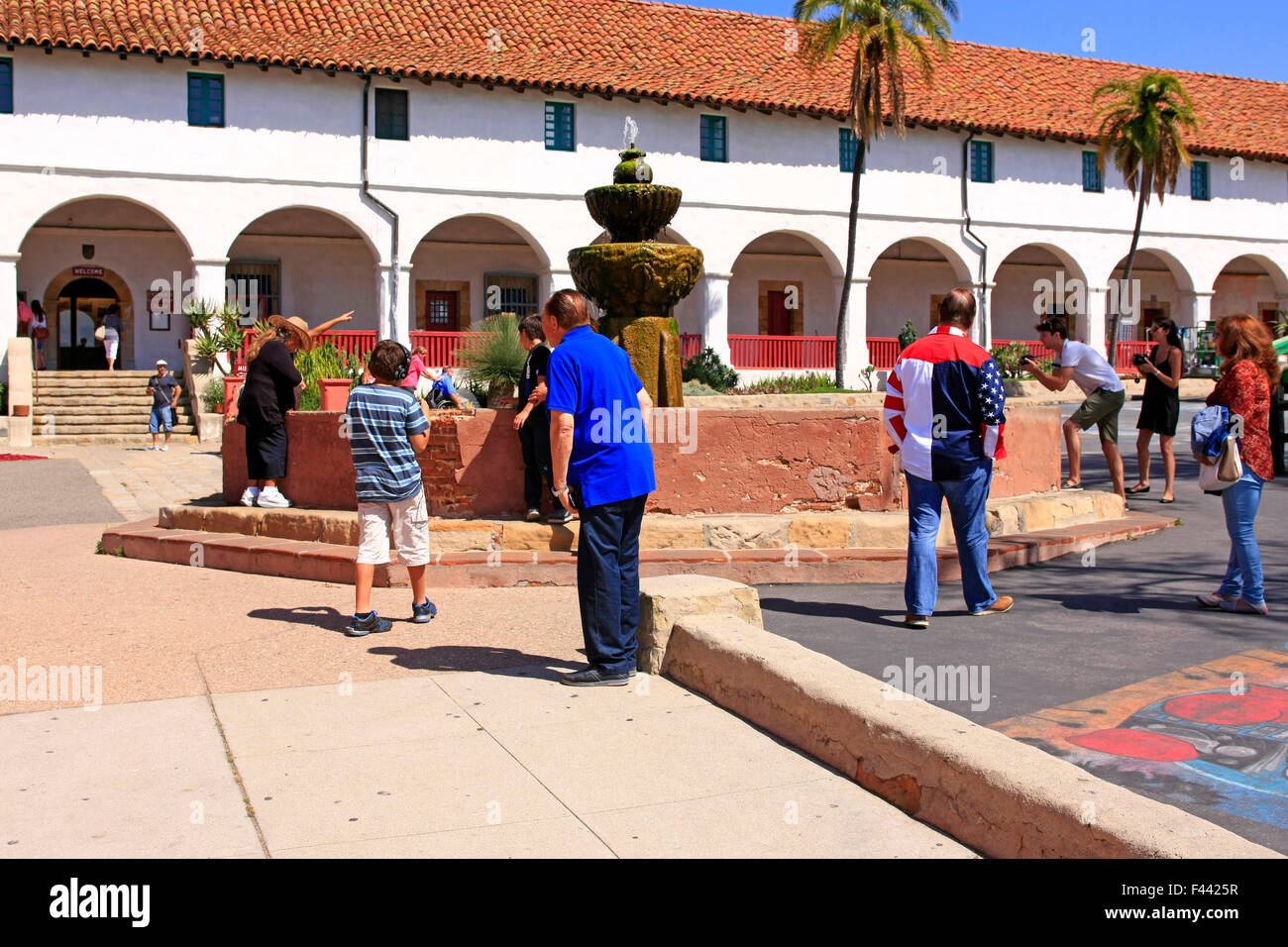 Latino tourists visit the Santa Barbara Mission in California. Founded by Padre Fermin Lasuen in 1786 Stock Photo
