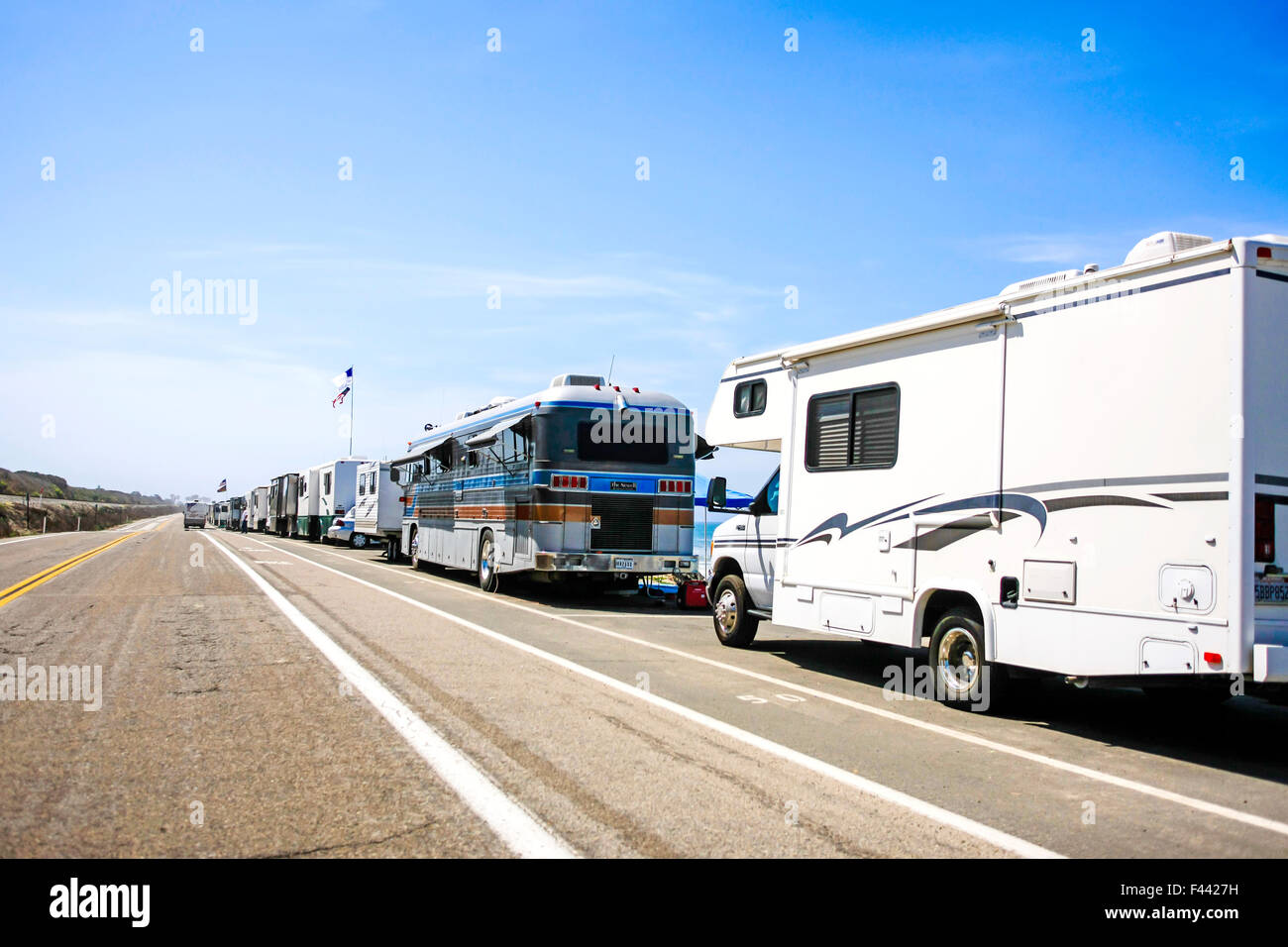 Motorhomes and travel trailers parked up on PCH Pacific Coast Highway