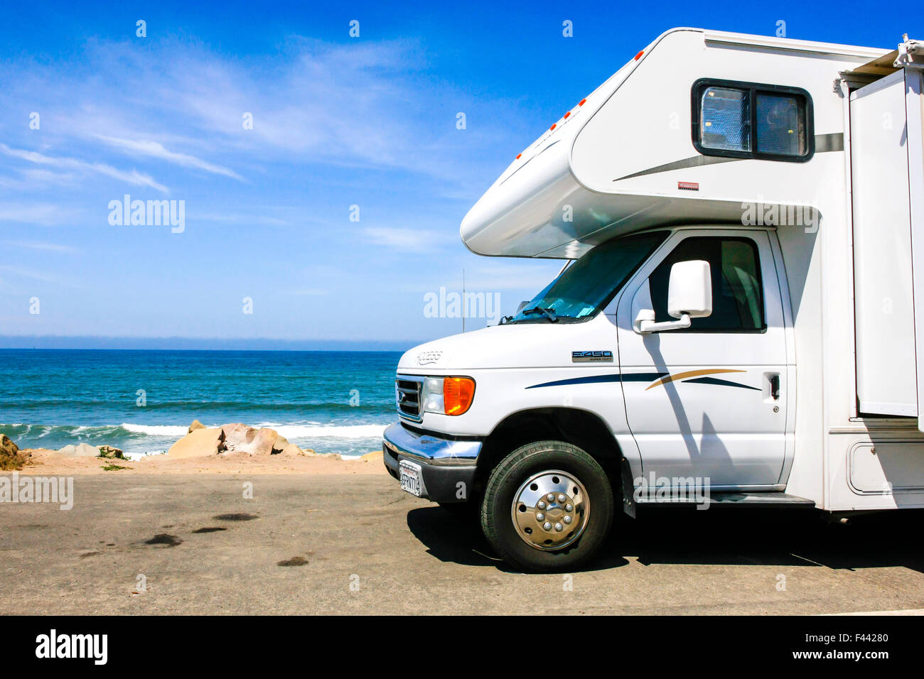 Motorhomes and travel trailers parked up on PCH Pacific Coast Highway