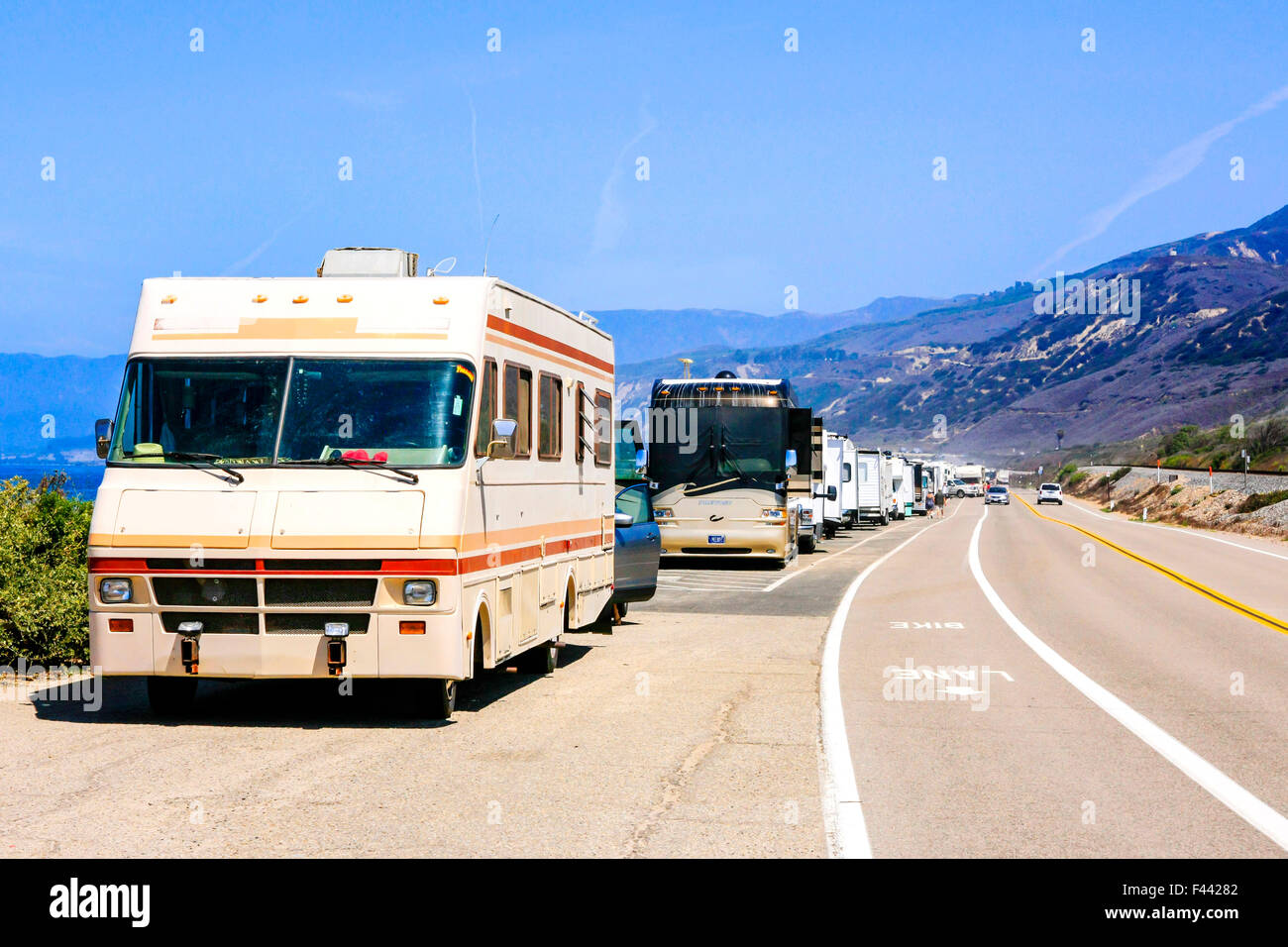 Motorhomes and travel trailers parked up on PCH Pacific Coast Highway