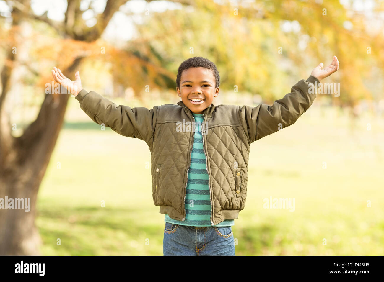Portrait of a little boy with outstretched arms Stock Photo