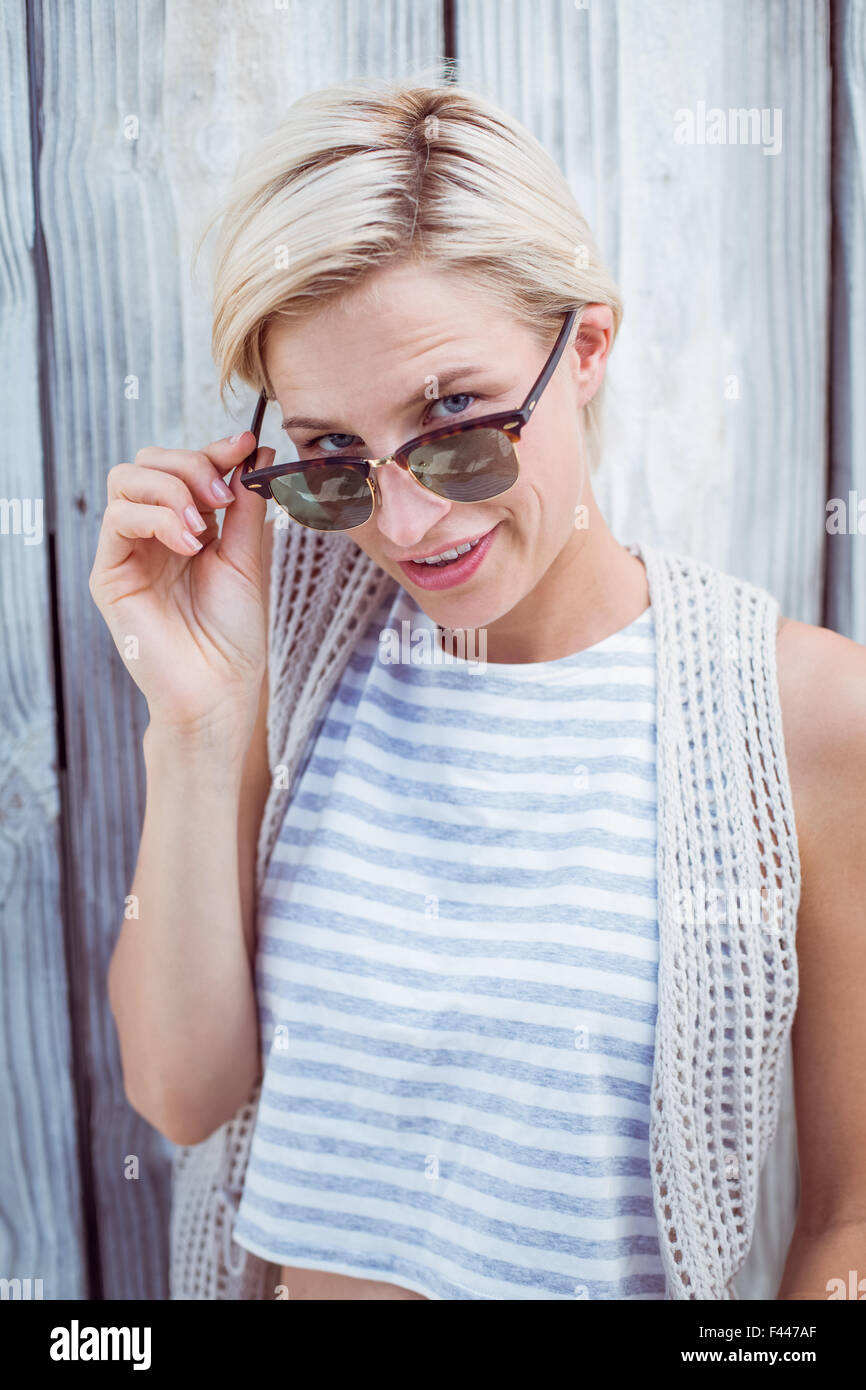 Pretty blonde woman smiling at the camera Stock Photo - Alamy