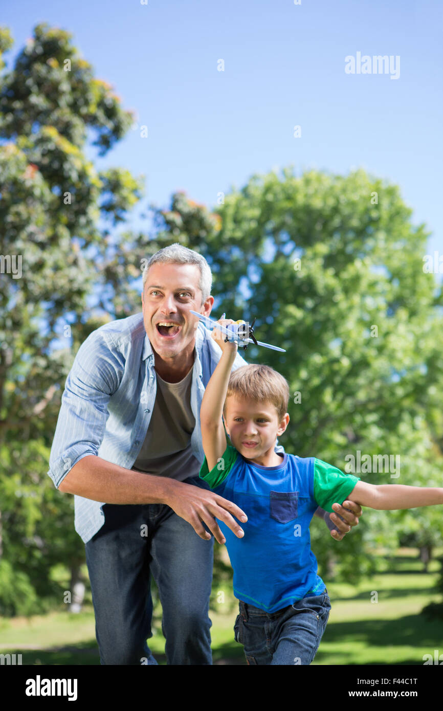 Father son park toy airplane hi-res stock photography and images - Alamy