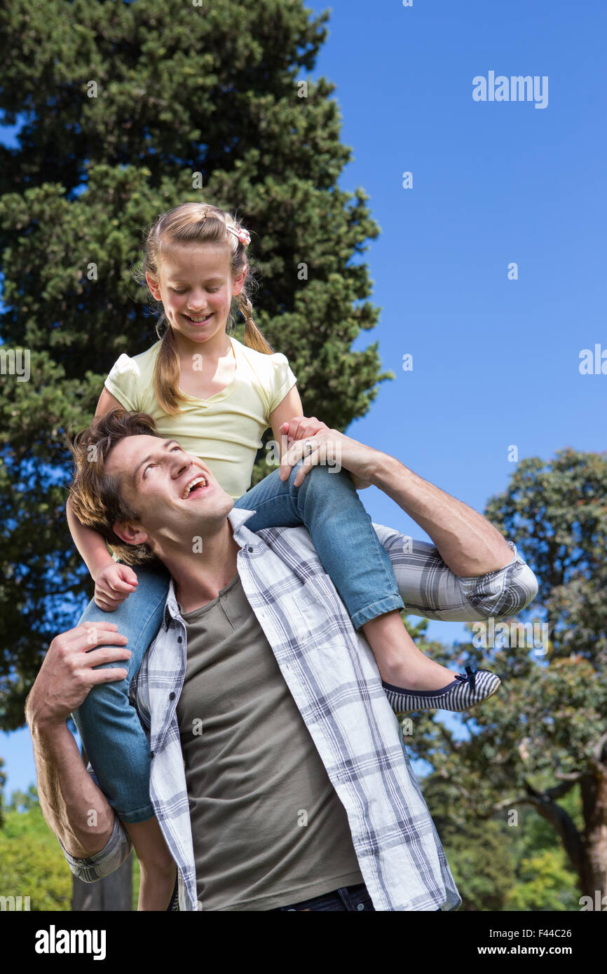 Father and daughter having fun in the park Stock Photo - Alamy