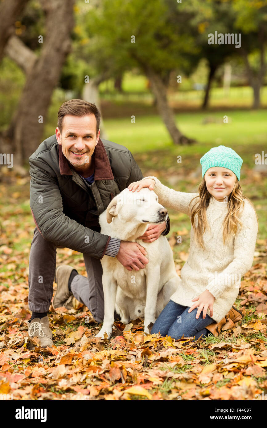 Young family with a dog Stock Photo