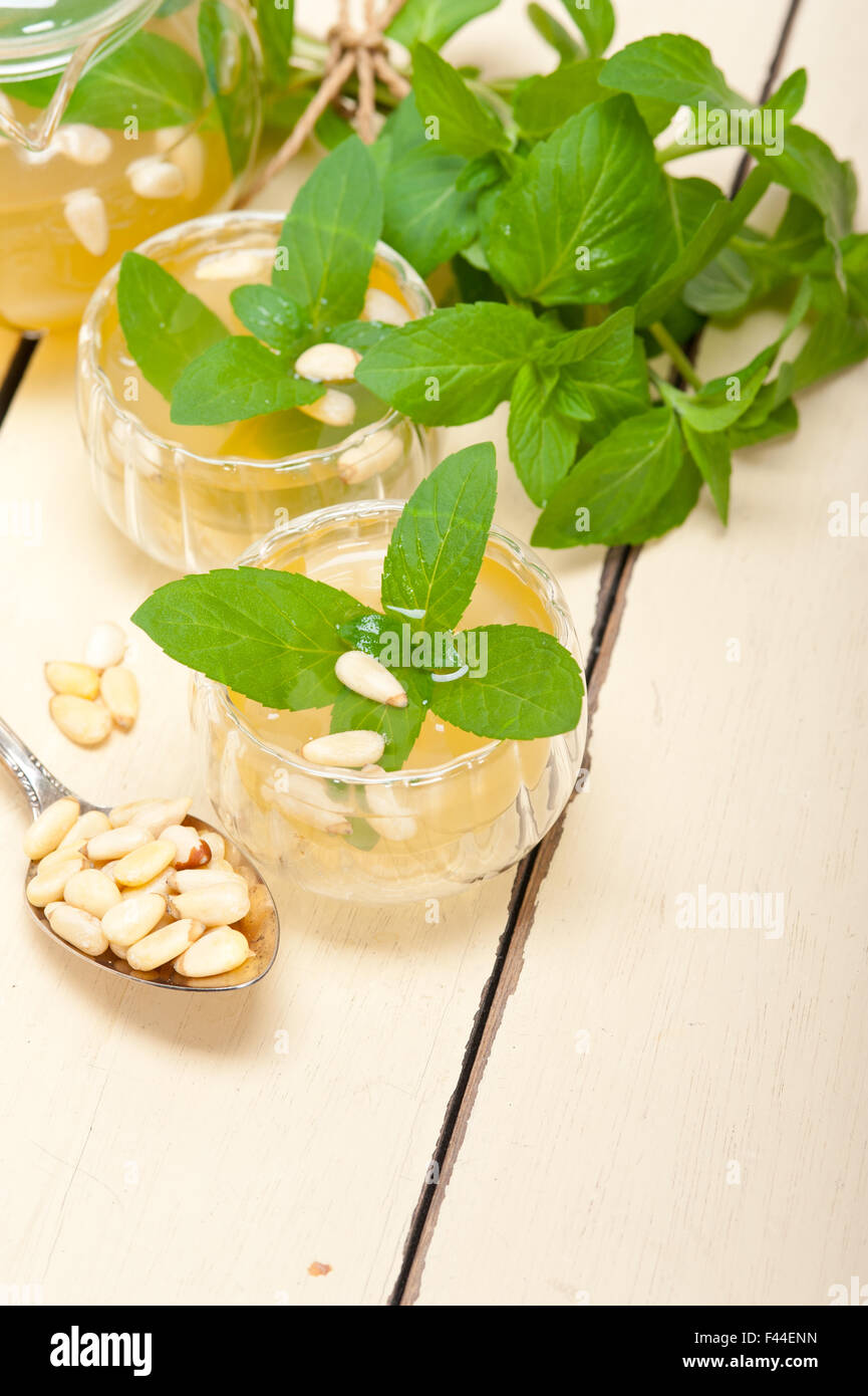 Arab traditional mint and pine nuts tea Stock Photo Alamy