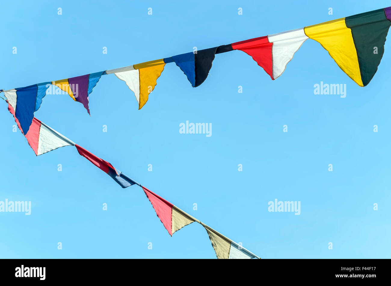 Flags used for medieval festivals. Blue sky on background. Stock Photo