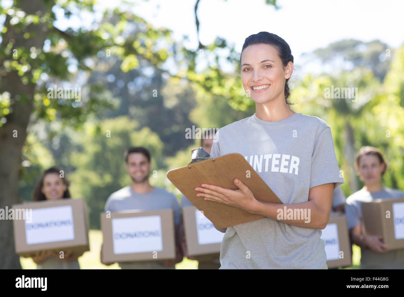 Black volunteer clipboard hi-res stock photography and images - Alamy