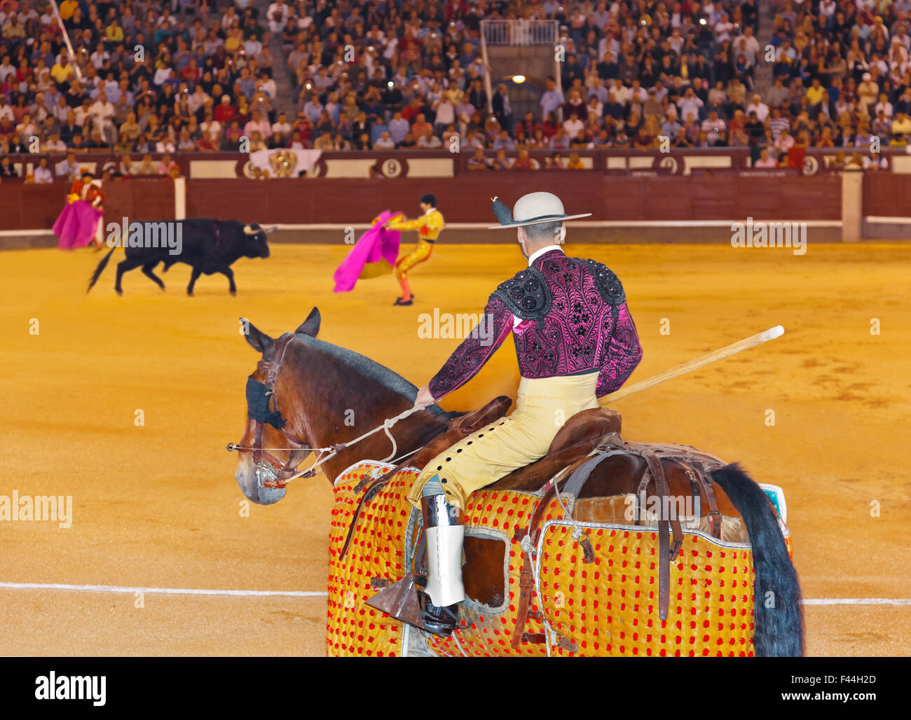 Matador and bull in bullfighting at Madrid Stock Photo
