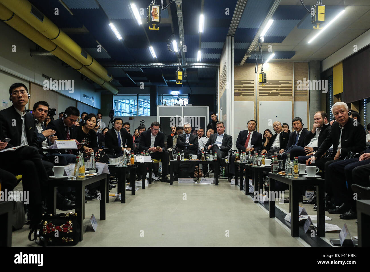 Potsdam. 14th Oct, 2015. Delegates from China Entrepreneur Club (CEC) and local business leaders attend a seminar during the CEC's visit at SAP Potsdam Innovation Center, in Potsdam, Germany, on Oct. 14. 2015. The CEC delegation of Chinese top businessmen, economists and diplomats arrived at Berlin on Tuesday for a 10-day visit to Germany and Italy to study local modern business civilization and find investment partners. Credit:  Zhang Fan/Xinhua/Alamy Live News Stock Photo