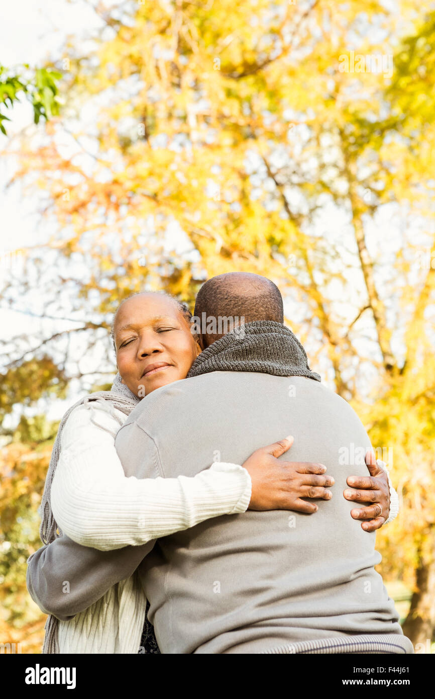 Peaceful happy senior couple embracing Stock Photo