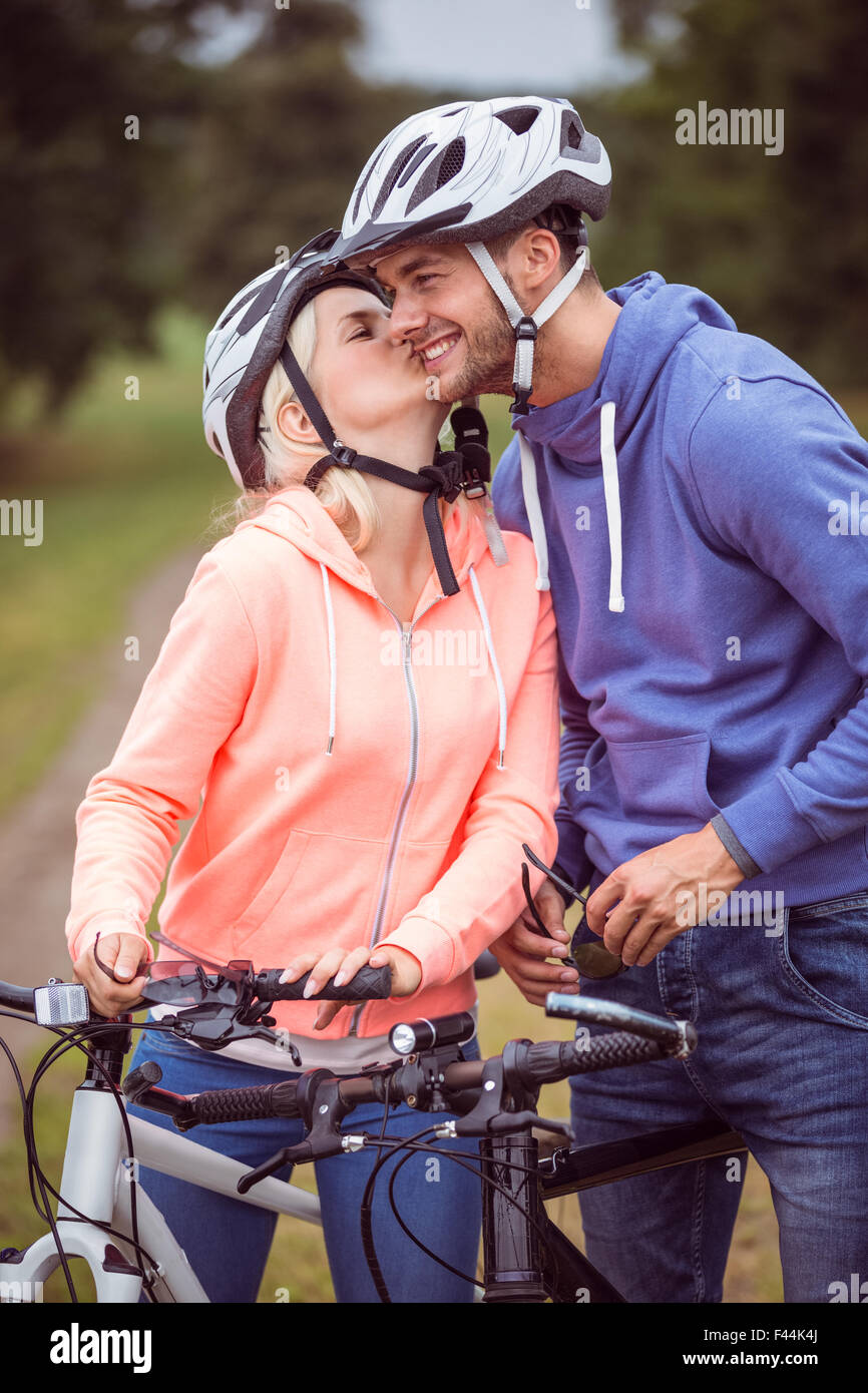 Happy couple on a bike ride Stock Photo