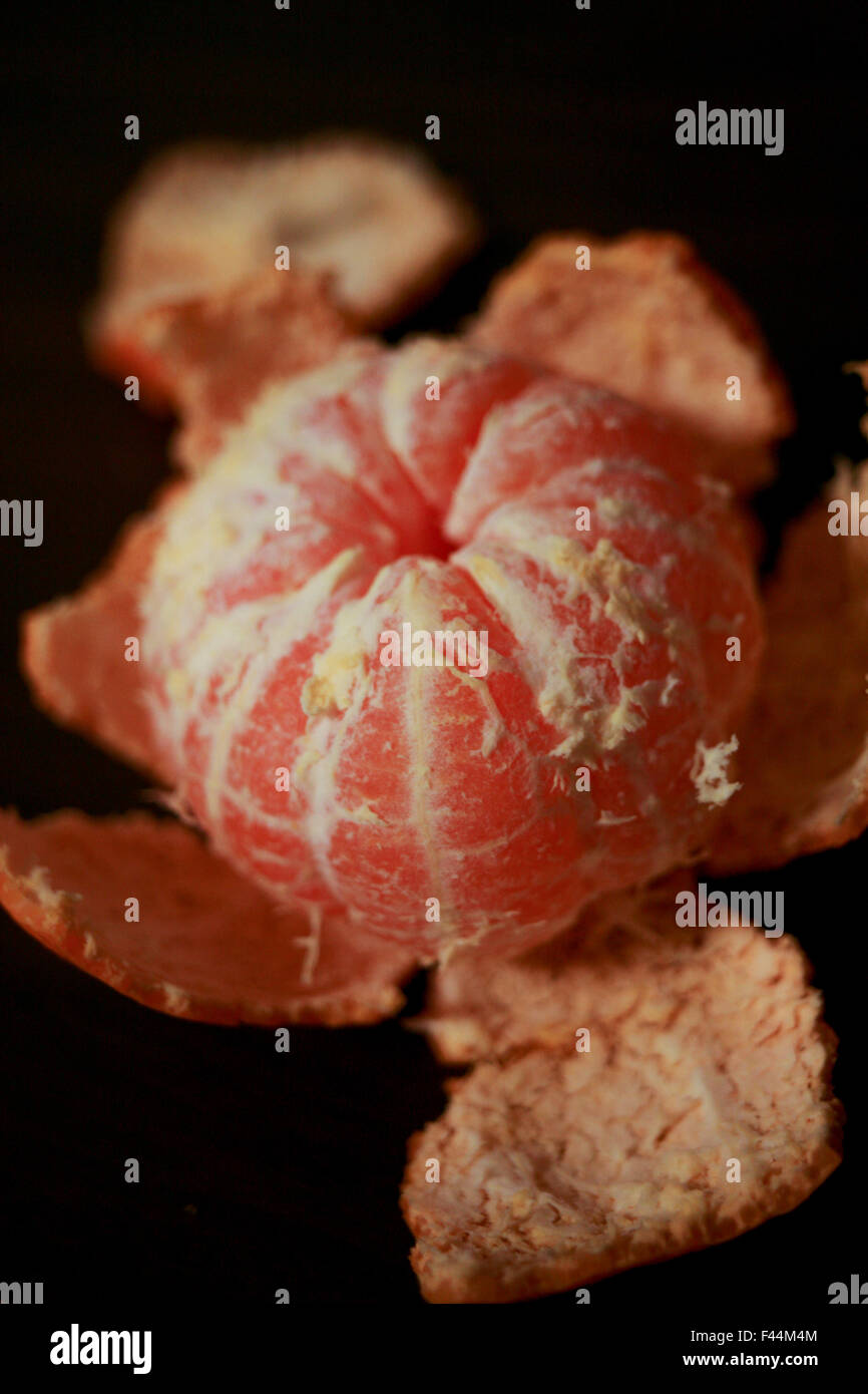 Mandarin mikan orange open peel Stock Photo Alamy