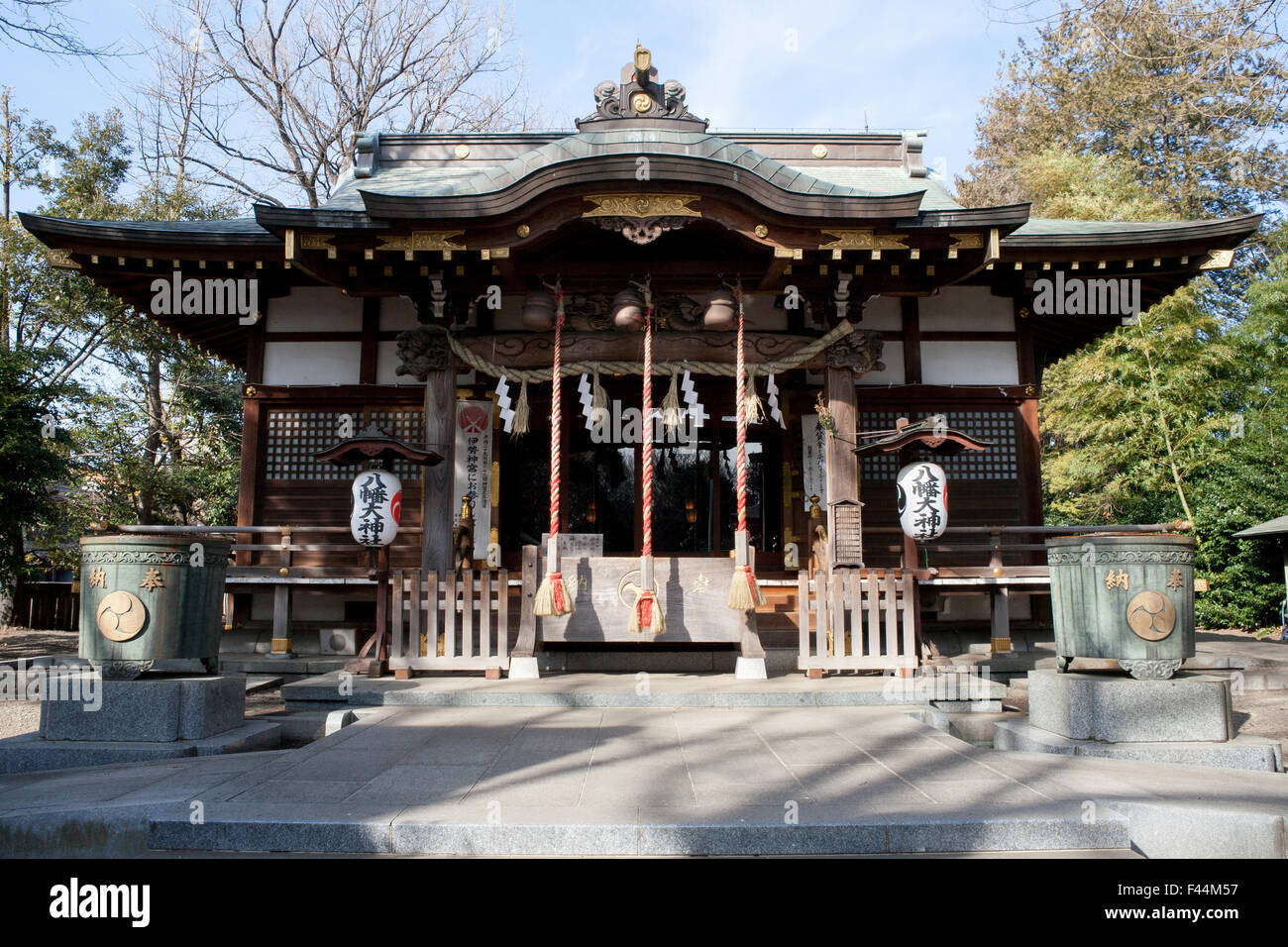 Shinto shrine with rope bells full frame Stock Photo - Alamy