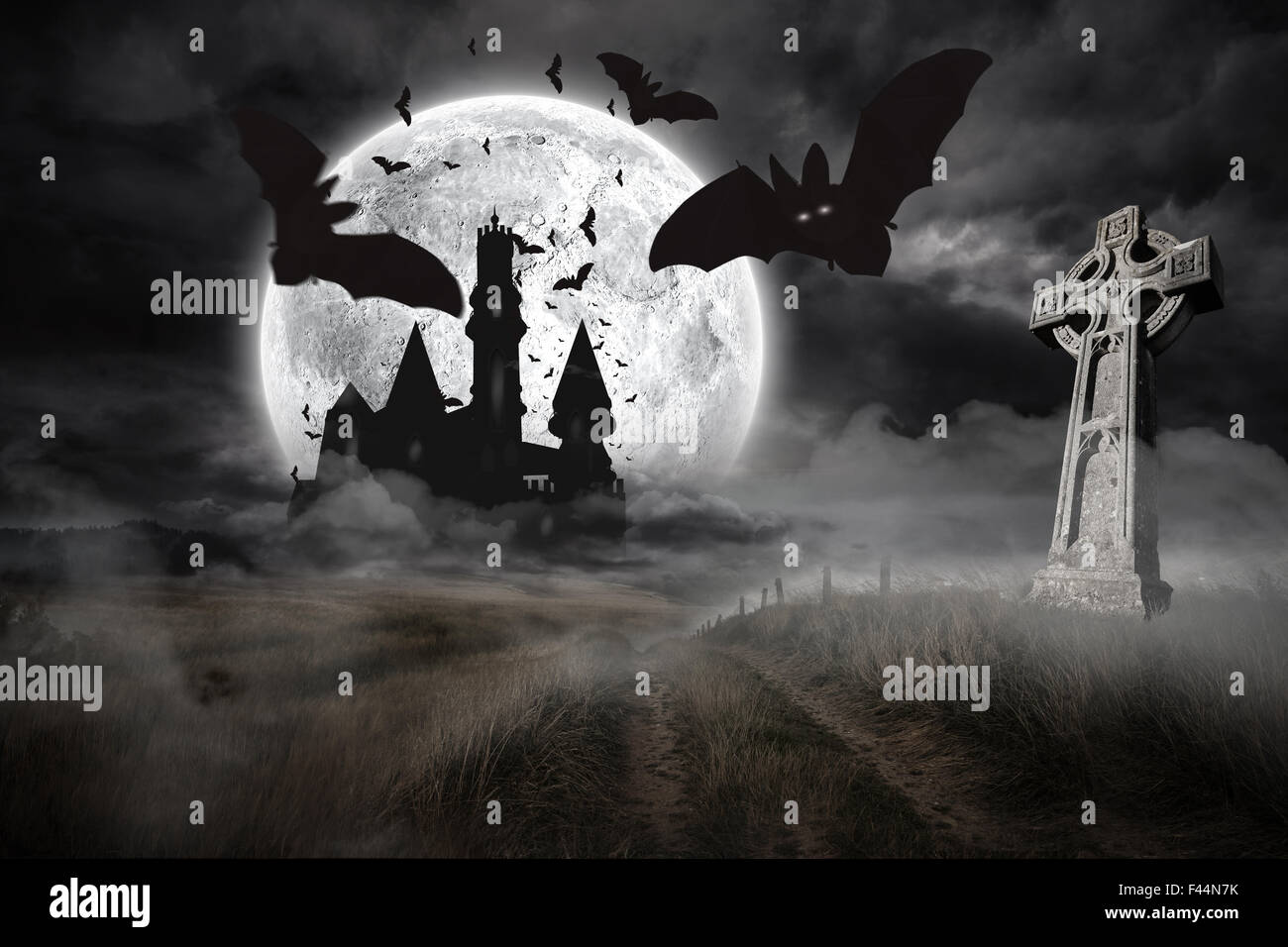 Bats flying from draculas castle Stock Photo