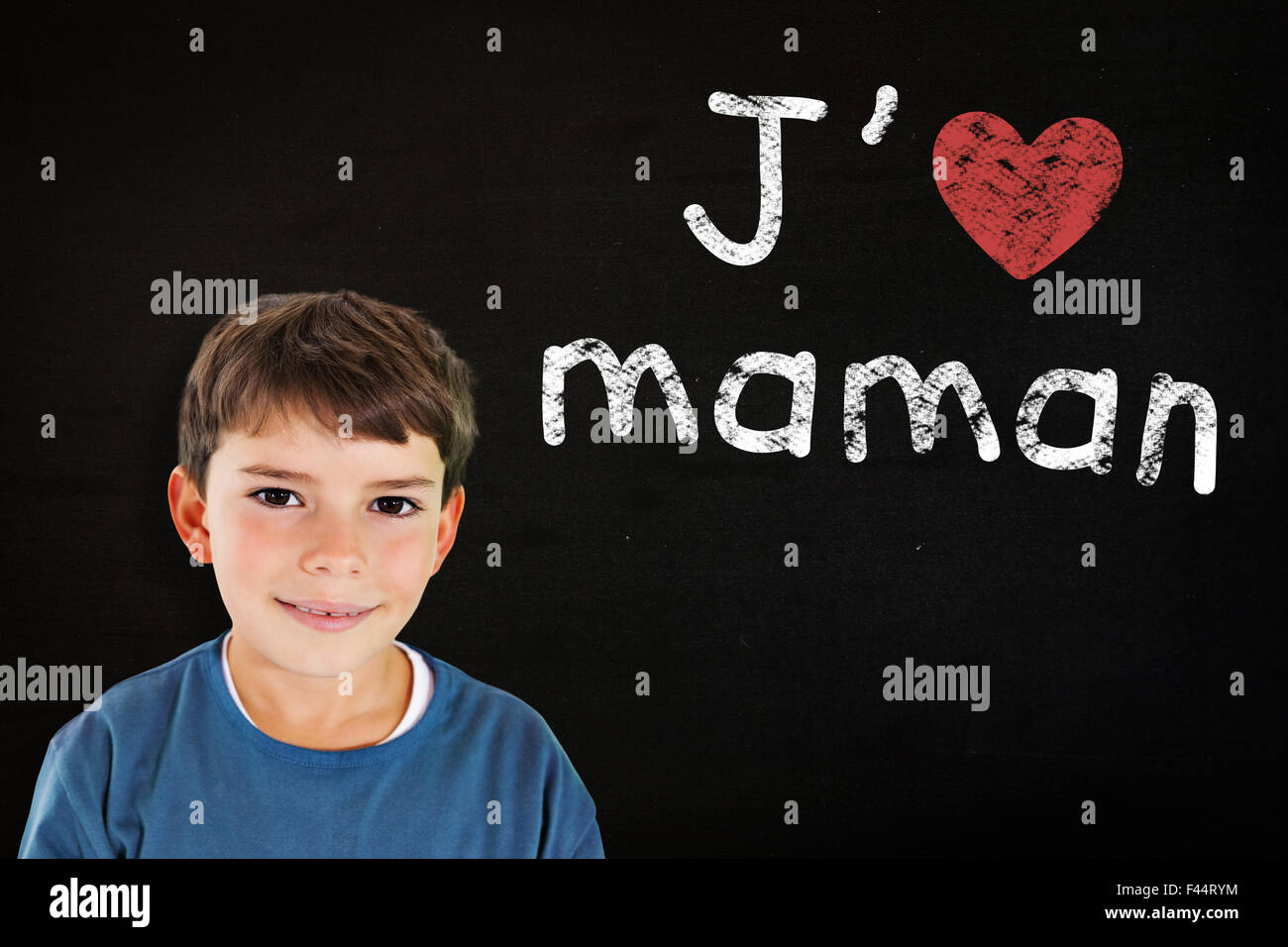Composite image of cute boy smiling Stock Photo - Alamy