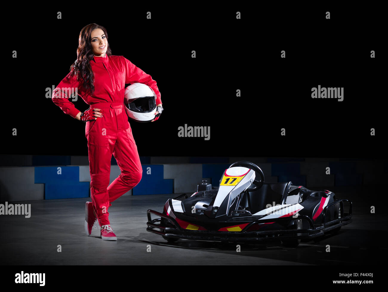 Young girl karting racer isolated Stock Photo - Alamy