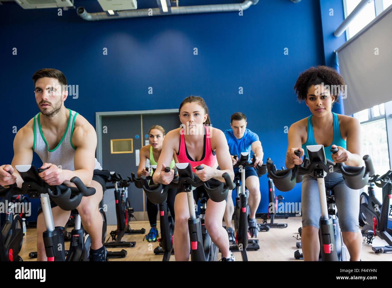 Fit people in a spin class Stock Photo