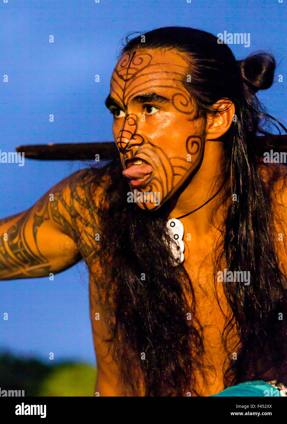 Native male Hawaiian performing traditional dance at Lua, Big Island, Hawai'i, USA Stock Photo