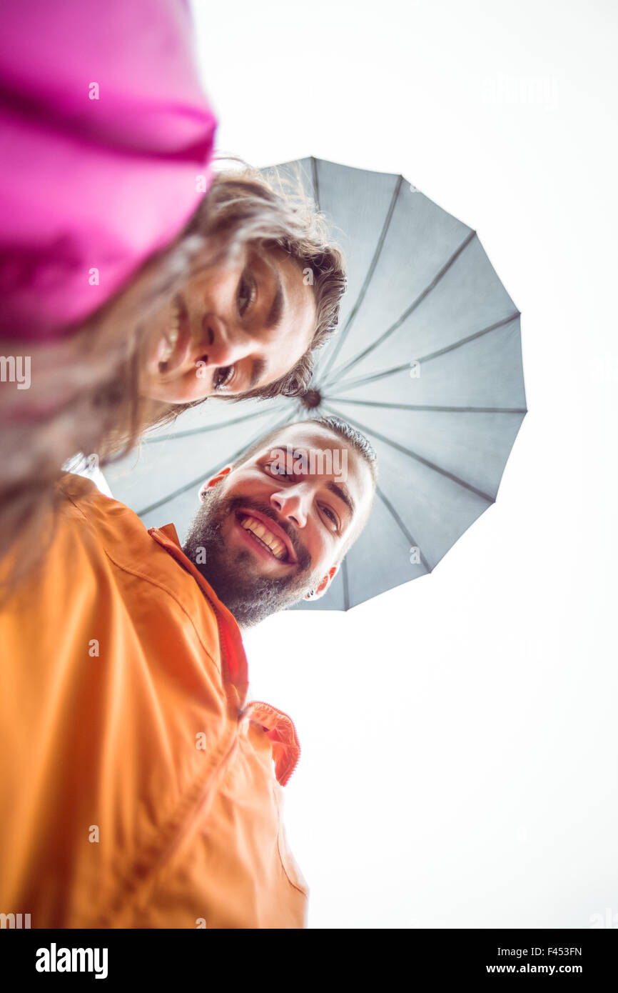 Man and woman under umbrella hi-res stock photography and images - Alamy