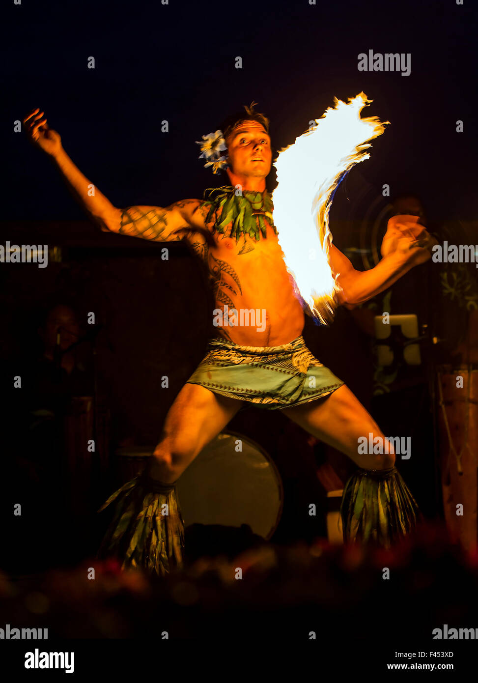 Native male Hawaiian performing traditional fire dance at Lua, Big Island, Hawai'i, USA Stock Photo