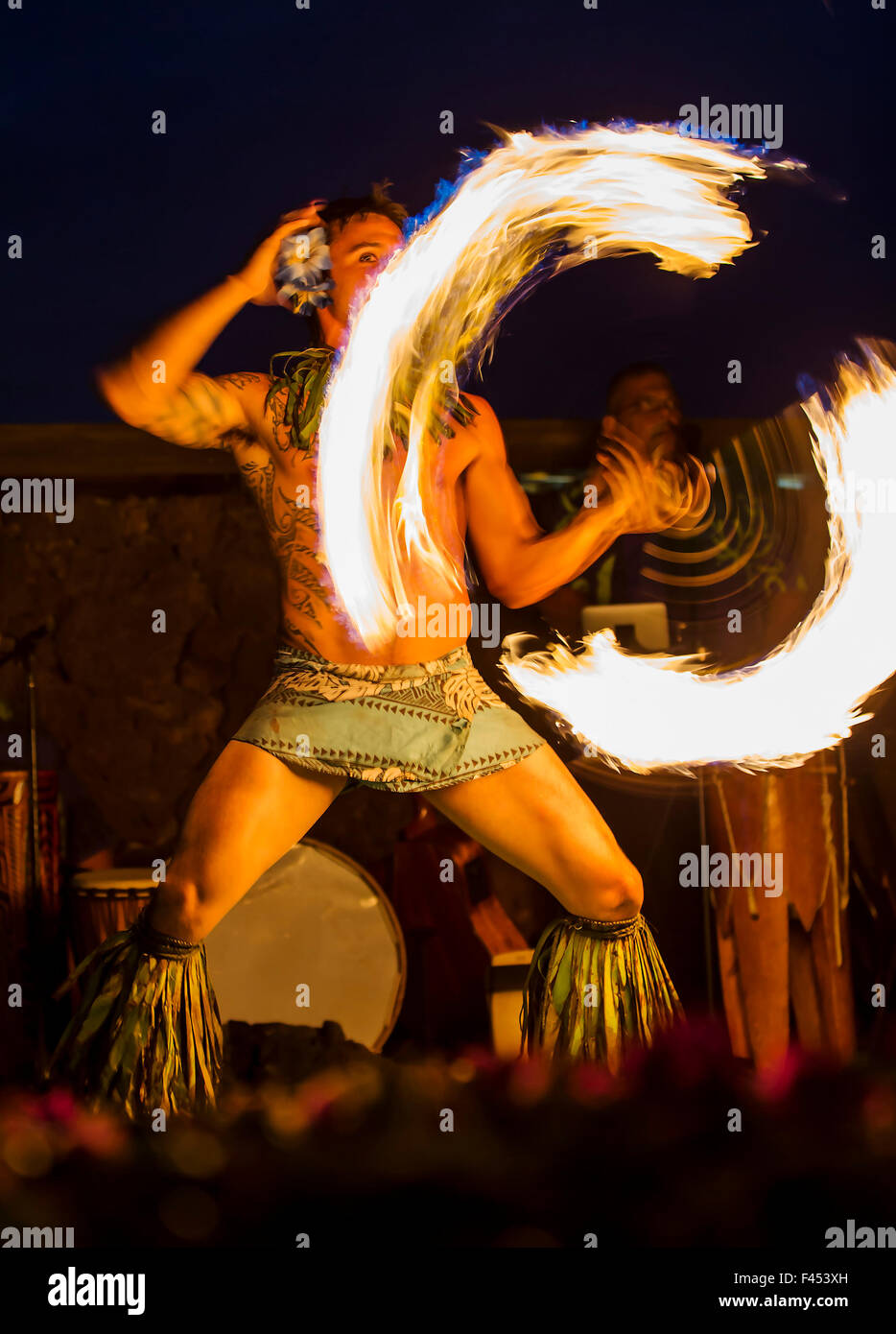 Native male Hawaiian performing traditional fire dance at Lua, Big