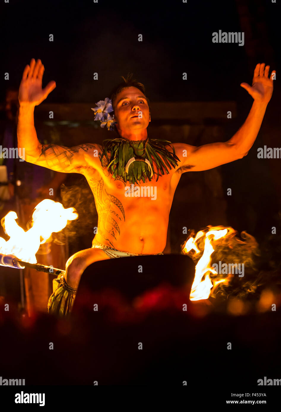 Native Male Hawaiian Performing Traditional Fire Dance At Lua Big