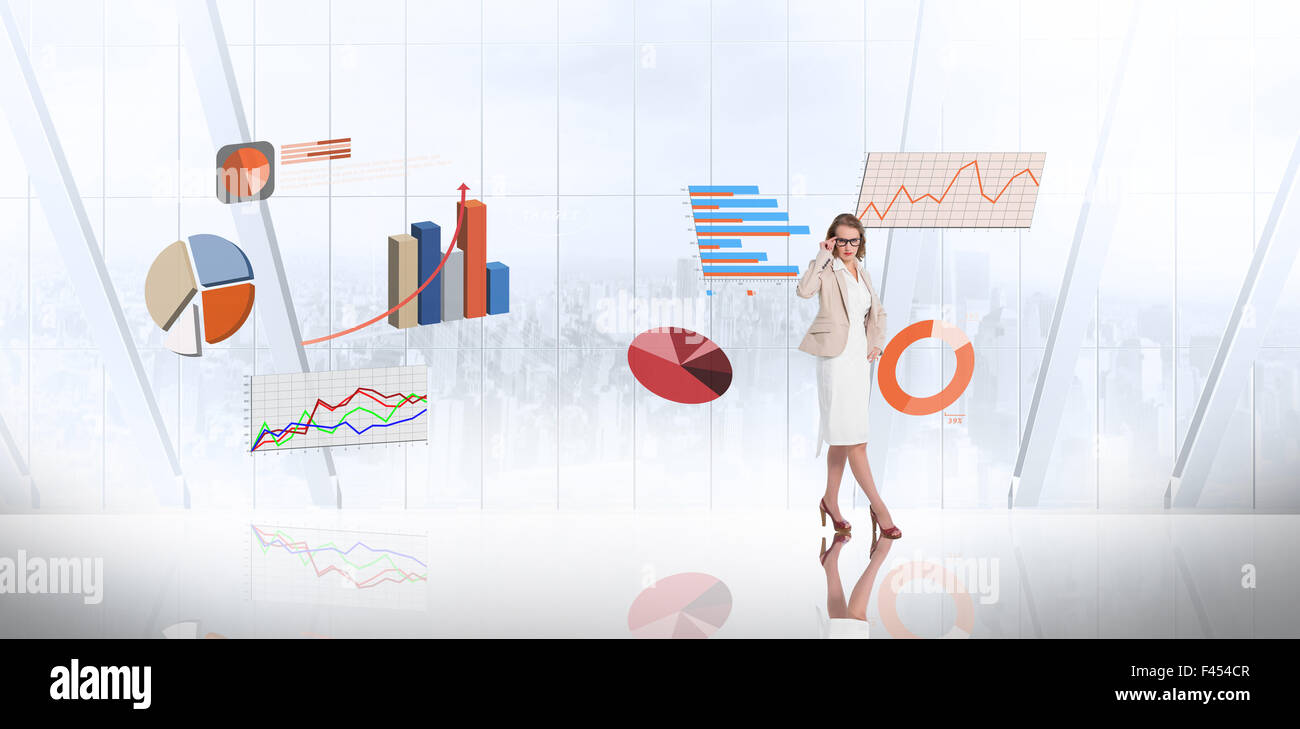 Composite image of smart businesswoman Stock Photo