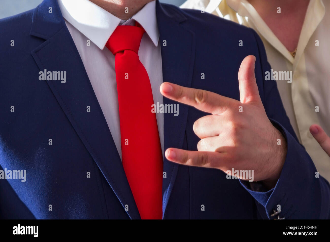 men's blue suit and red tie Stock Photo Alamy