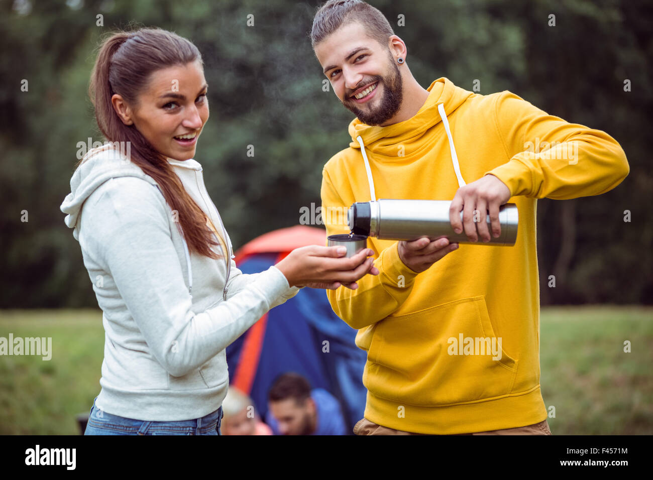 Happy friends on a camping trip Stock Photo