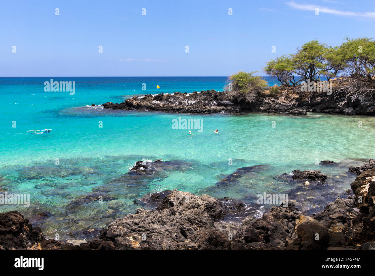 Tourists swimming and snorkeling at Hapuna Beach, Kohala Coast, Hawai'i, USA Stock Photo