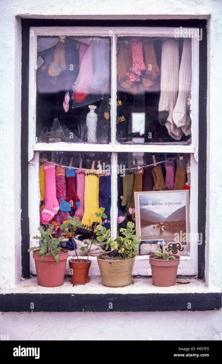 A Cottage Window Frames A Colorful Display Of Locally Made Woolen
