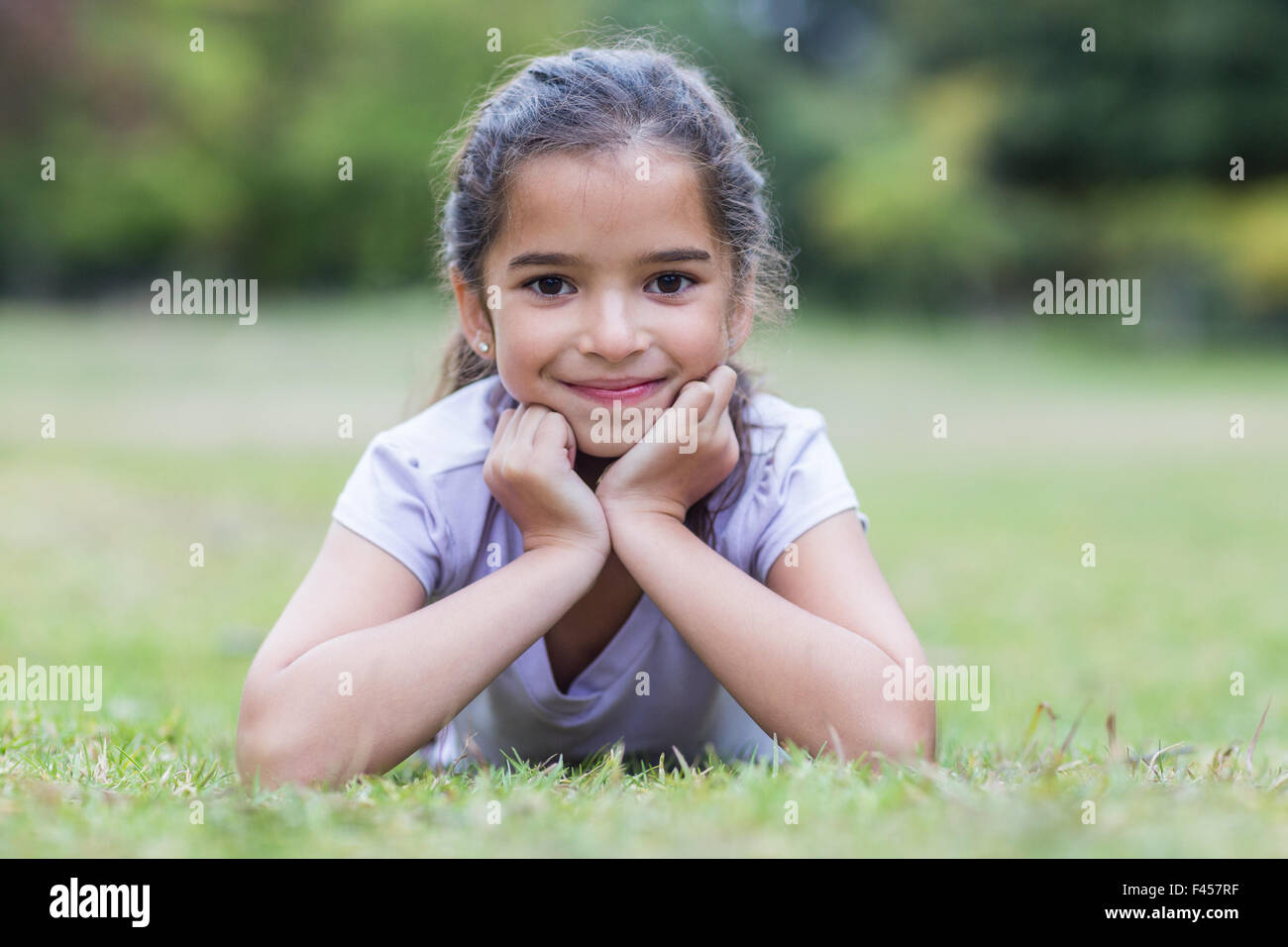 Little girl smiling at the camera Stock Photo - Alamy
