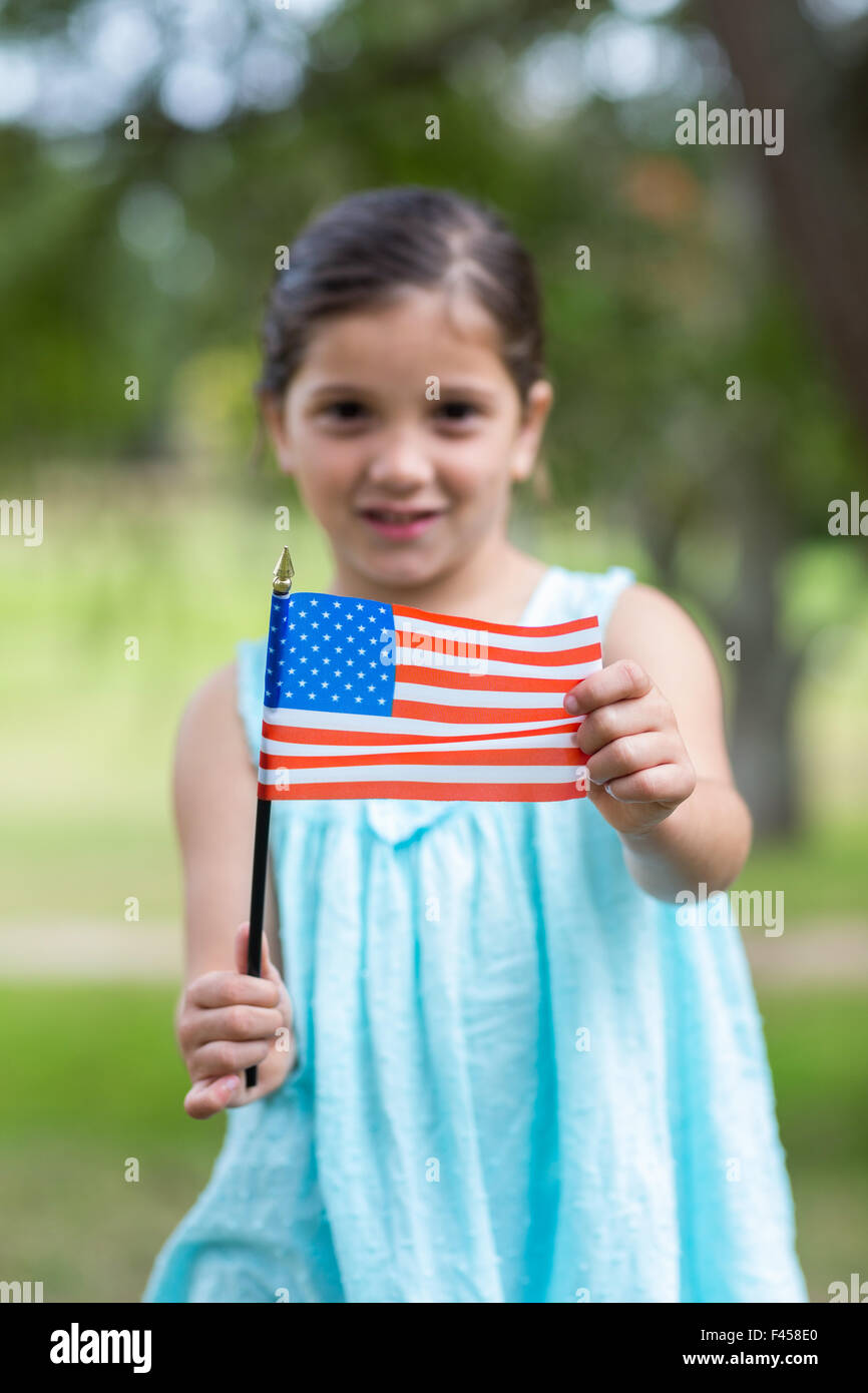 Little girl waving american flag Stock Photo Alamy