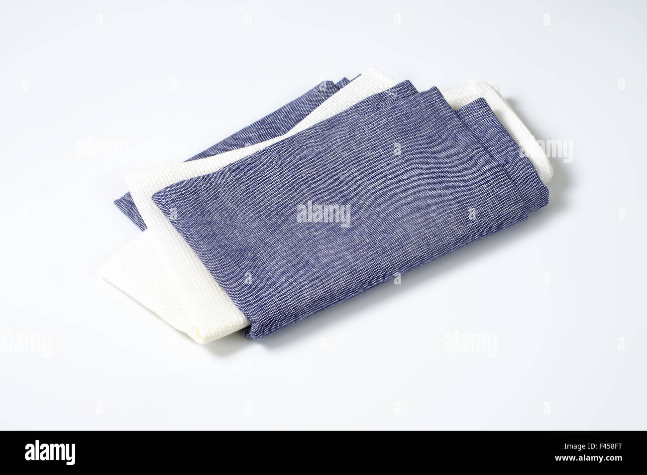 blue and white napkins on white background Stock Photo Alamy