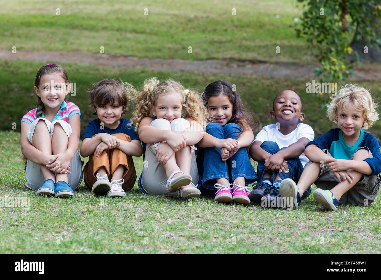 Happy child in the park together Stock Photo - Alamy