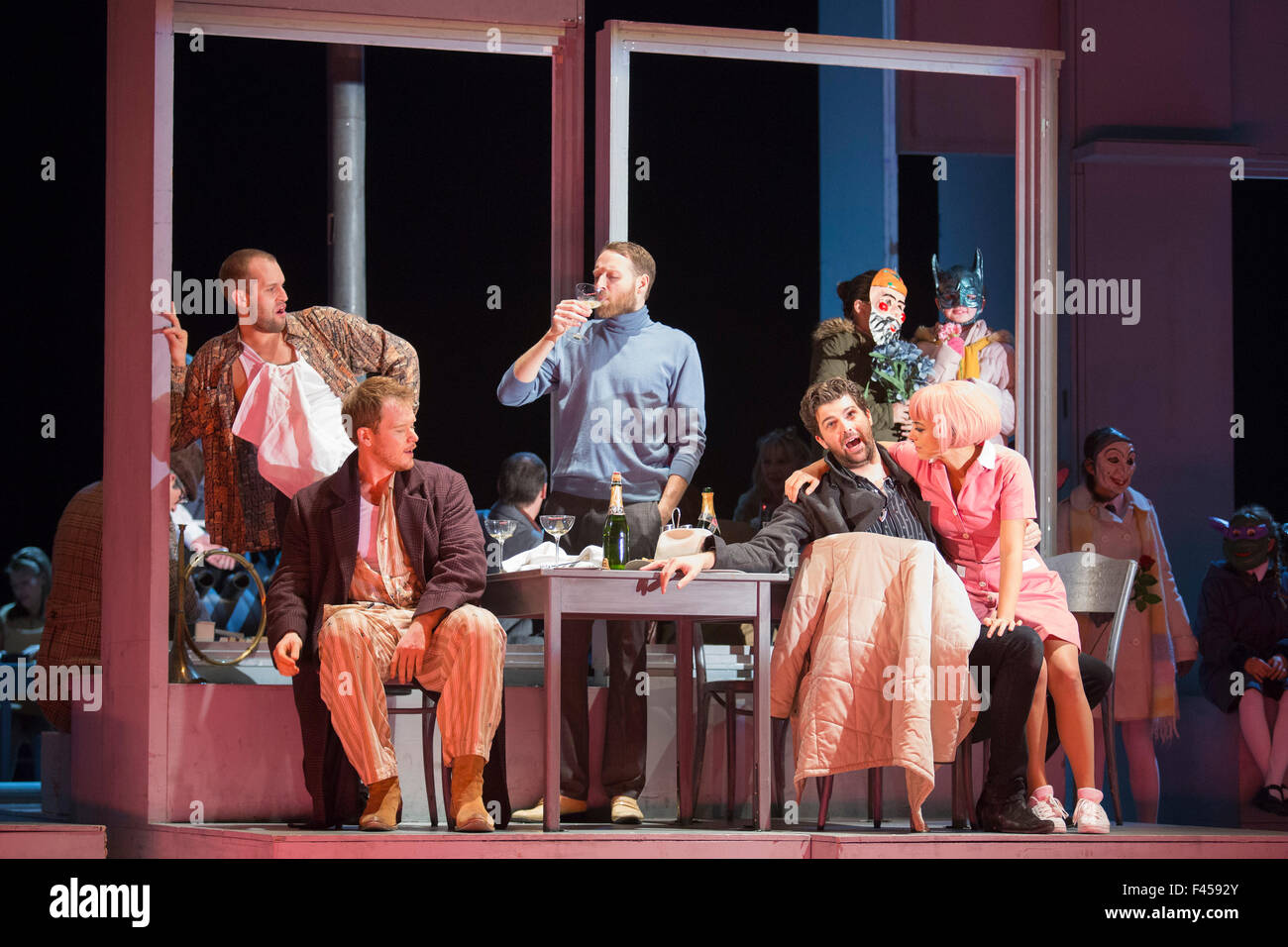 London, UK. 14/10/2015. Dress rehearsal of the Giacomo Puccini opera La Boheme directed by Benedict Andrews at the London Coliseum. Conducted by Xian Zhang. Cast: Corinne Winters as Mimi, Zach Borichevsky as Rodolfo, Duncan Rock as Marcello and Rhian Lois as Musetta. Stock Photo
