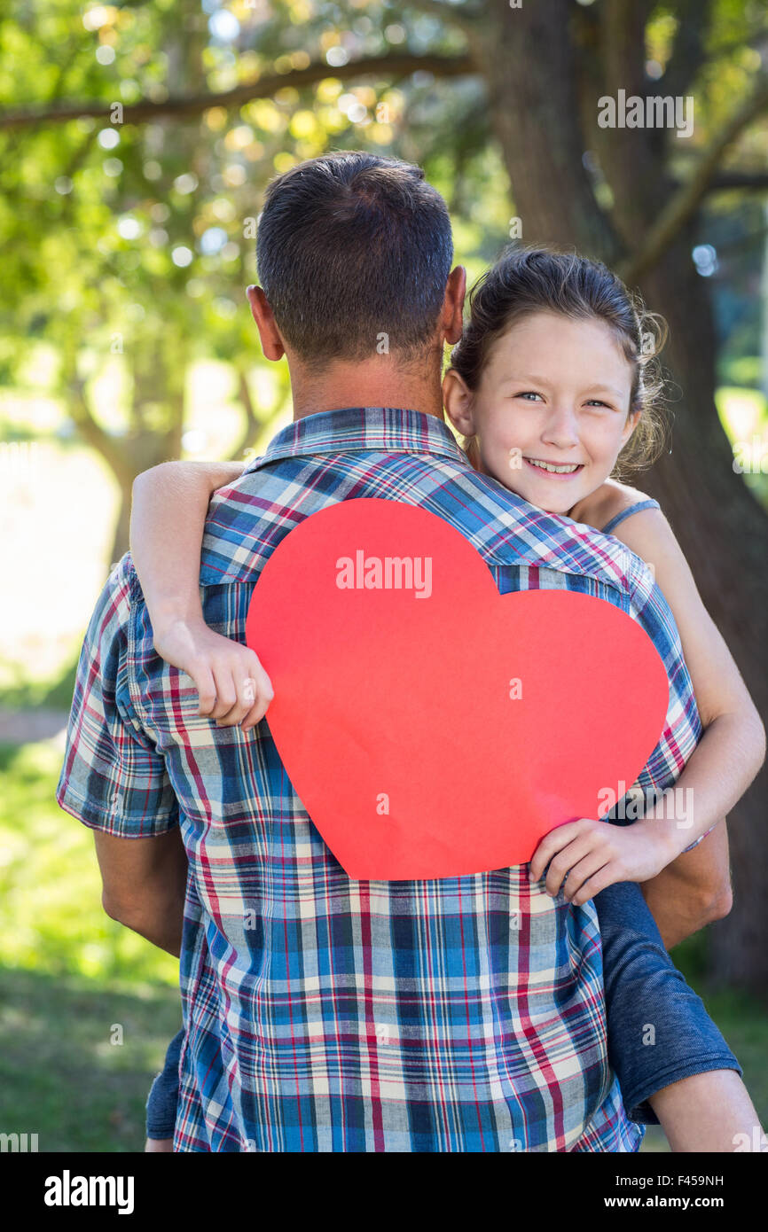 Father and daughter hugging in the park Stock Photo - Alamy