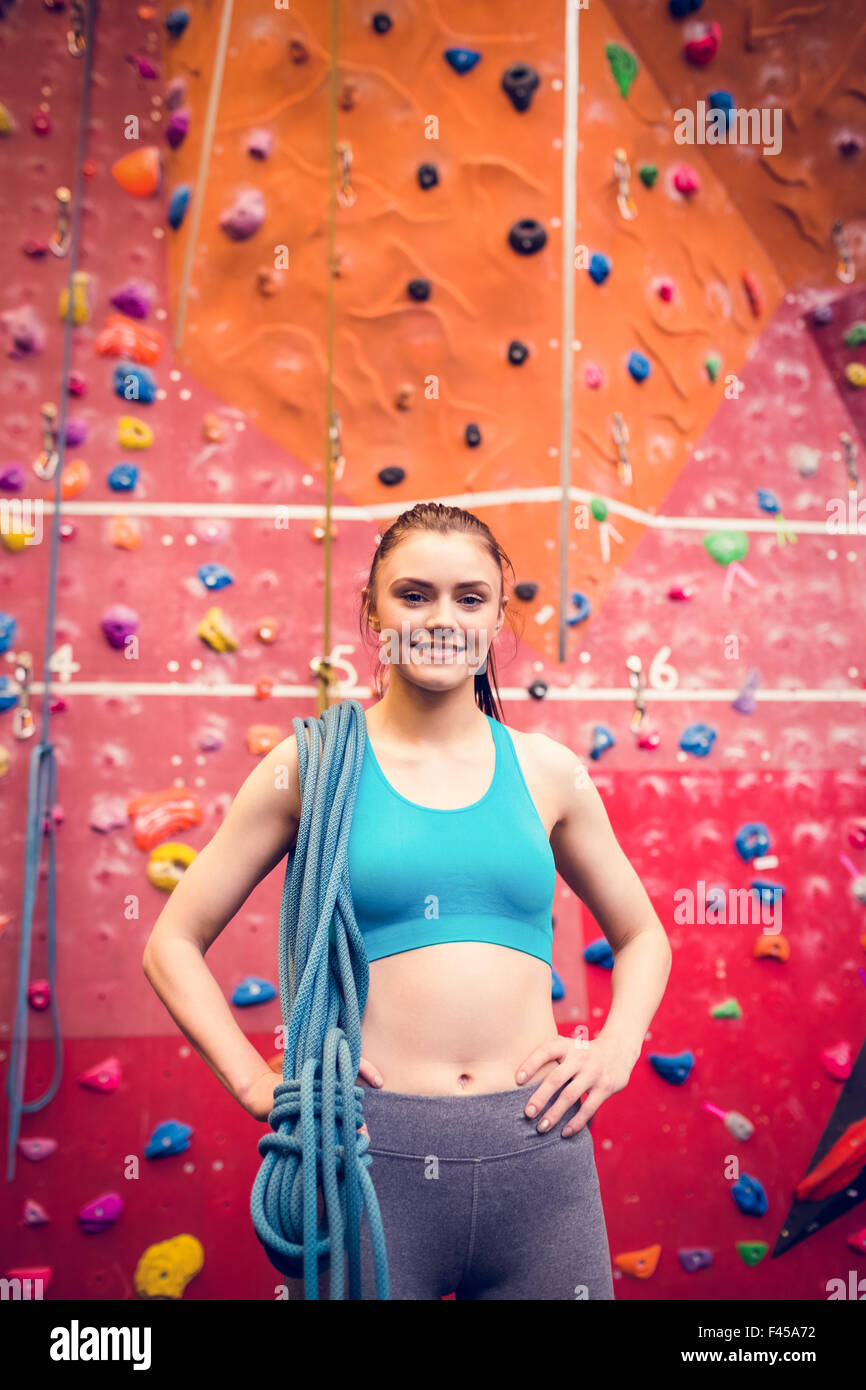 Fit woman at the rock climbing wall Stock Photo Alamy