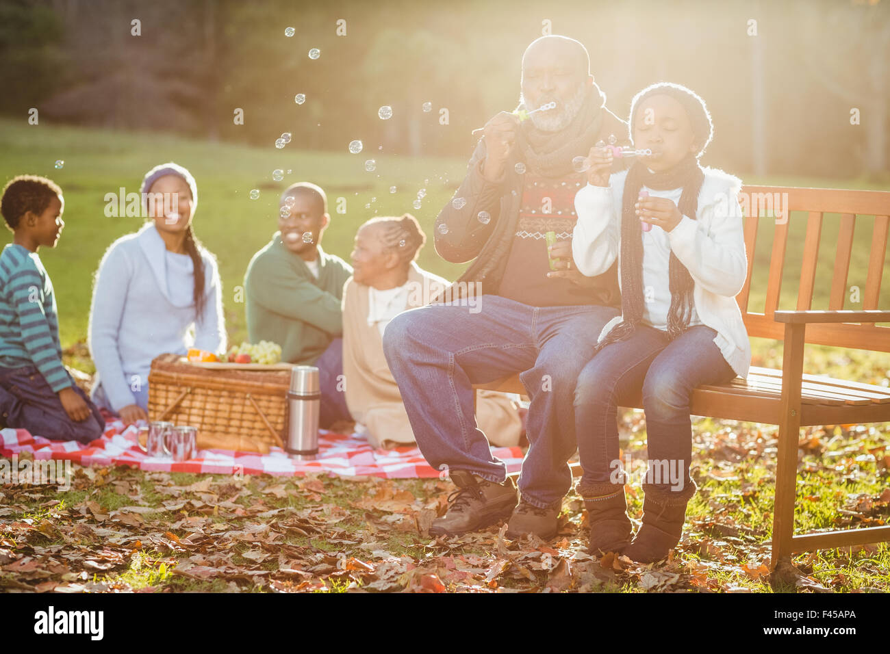 Happy family having a picnic Stock Photo