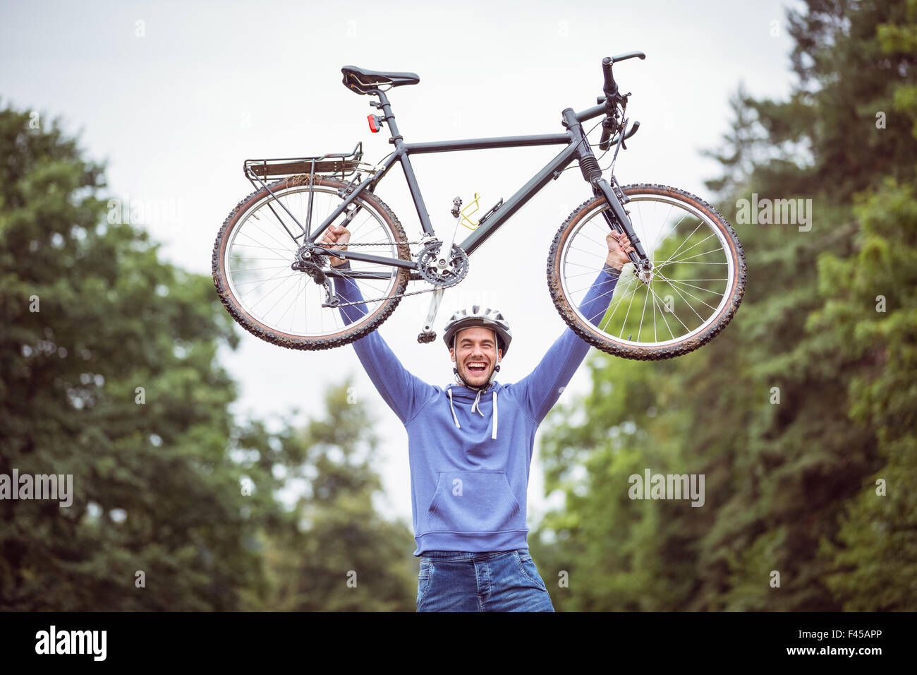 Man holding up his mike Stock Photo