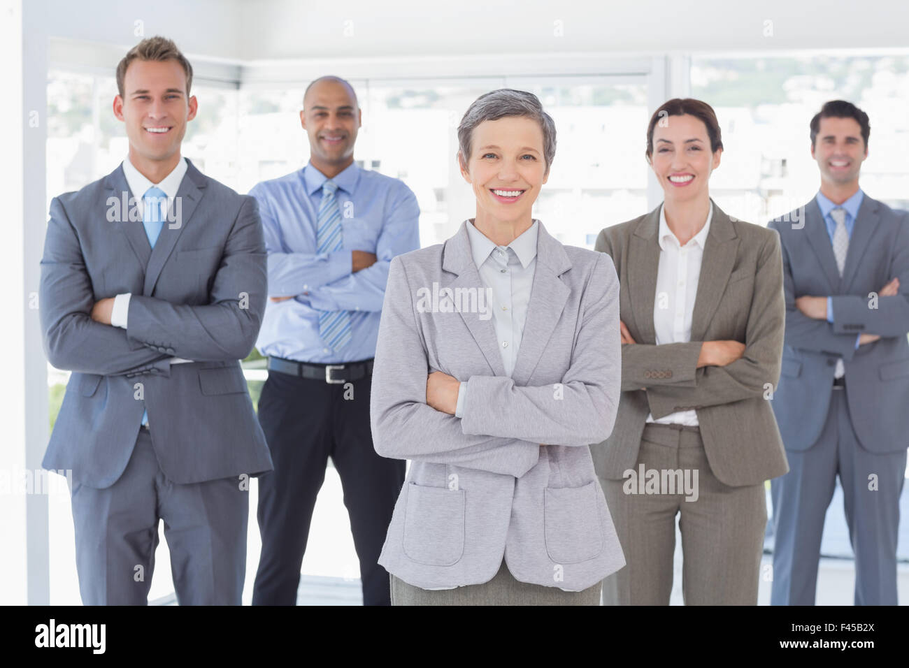 Business team smiling at camera Stock Photo - Alamy