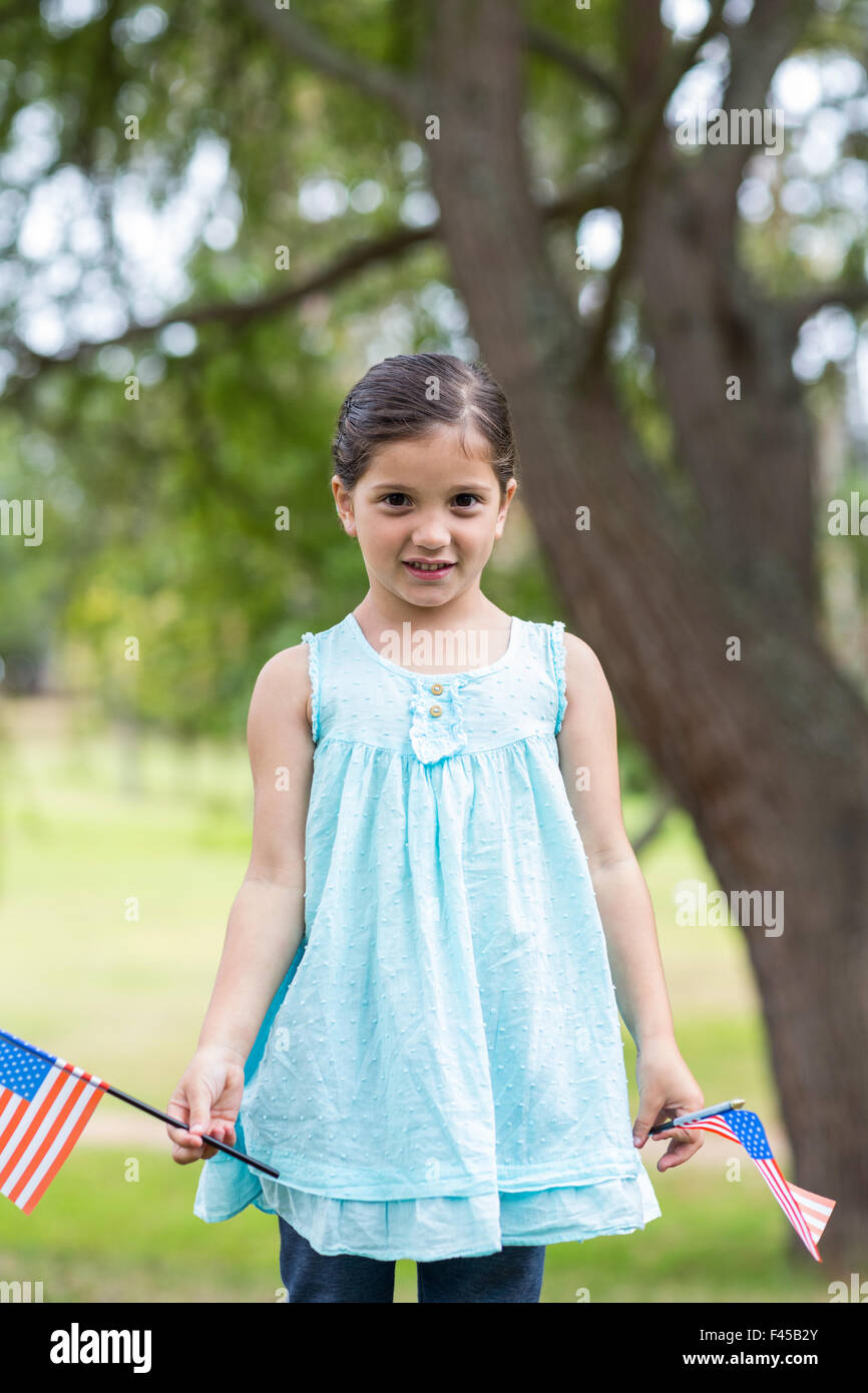 Little girl waving american flag Stock Photo - Alamy